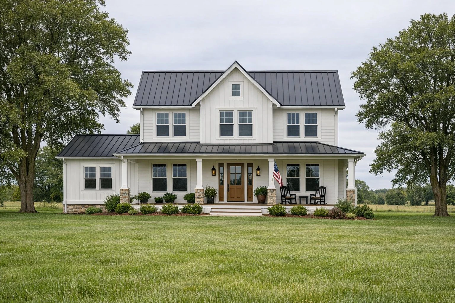 Exterior view of a farmhouse-style home with modern windows and entry doors, representing window and door options for Donnellson, IA homes by Doors-N-More