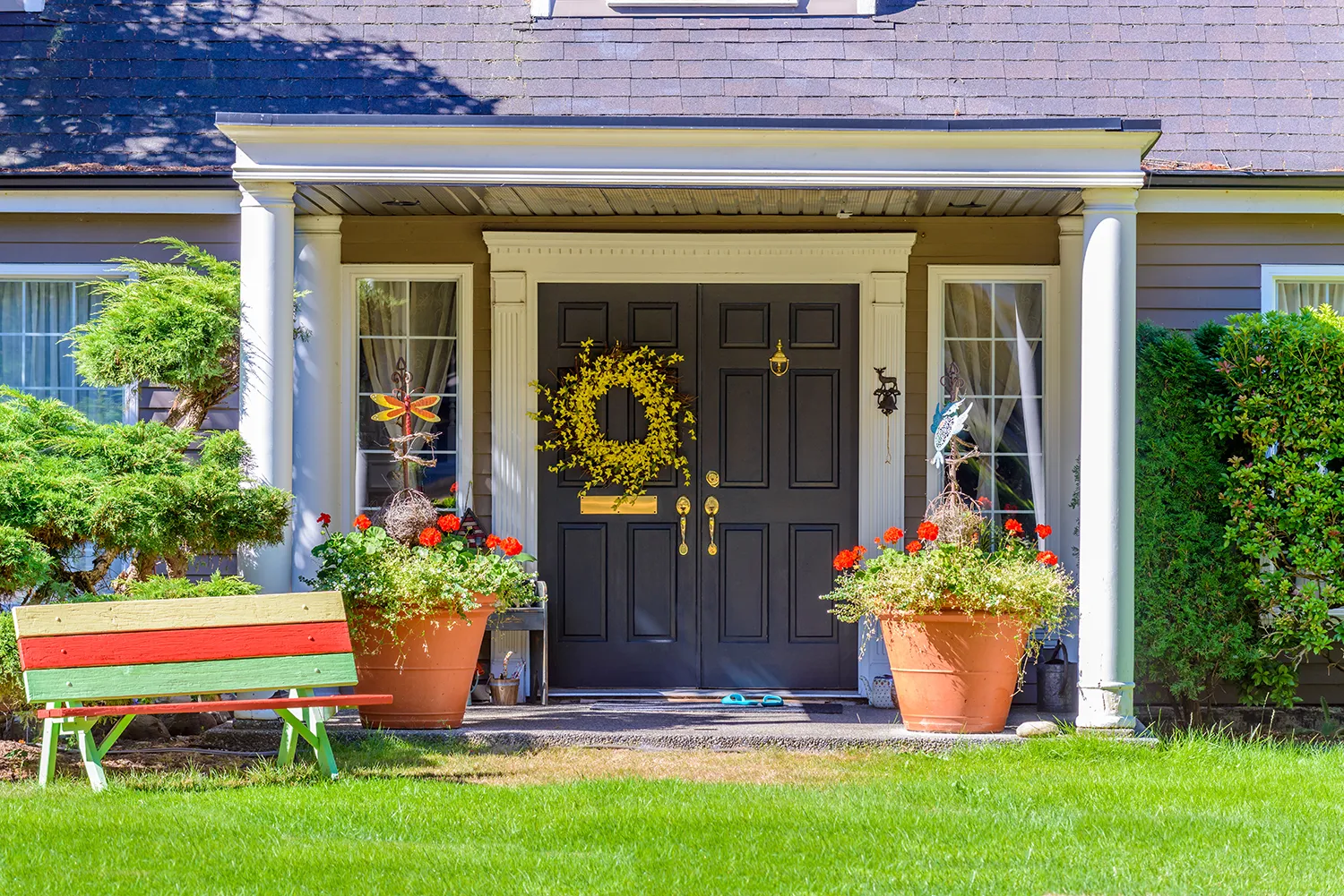Frankford MO replacement double entry doors with updated front porch curb appeal on traditional home