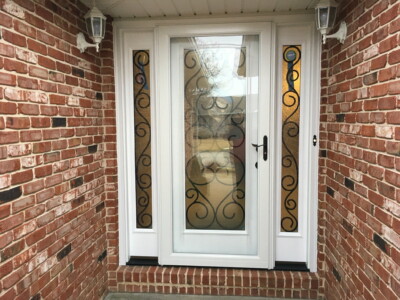Exterior Door with Double Sidelites and Storm Door by Doors-N-More